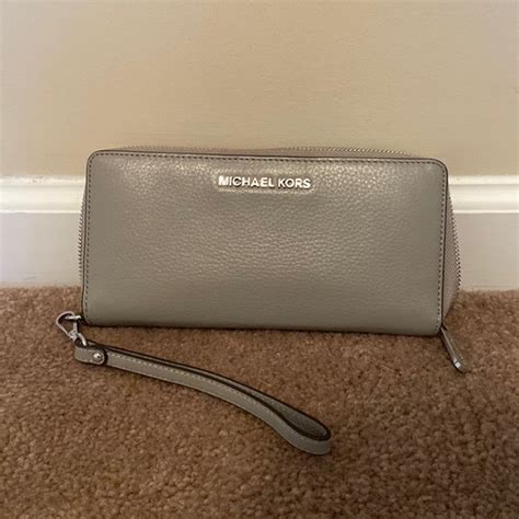 michael michael kors item 0858536|Michael Kors Large Pebbled Leather Continental Wallet (Teal).